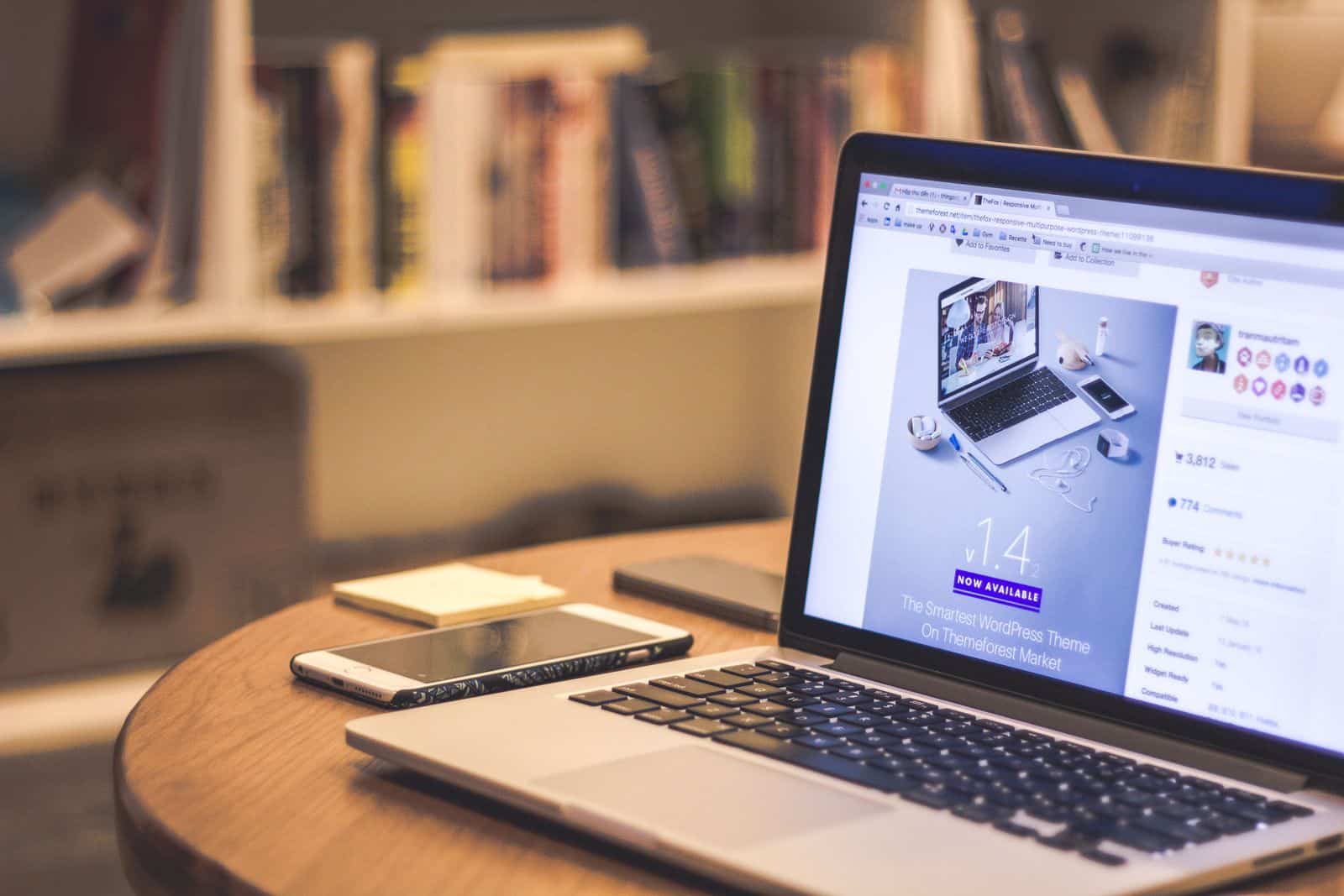 Laptop showing a website builder interface with design bookmarks, representing AI website builders