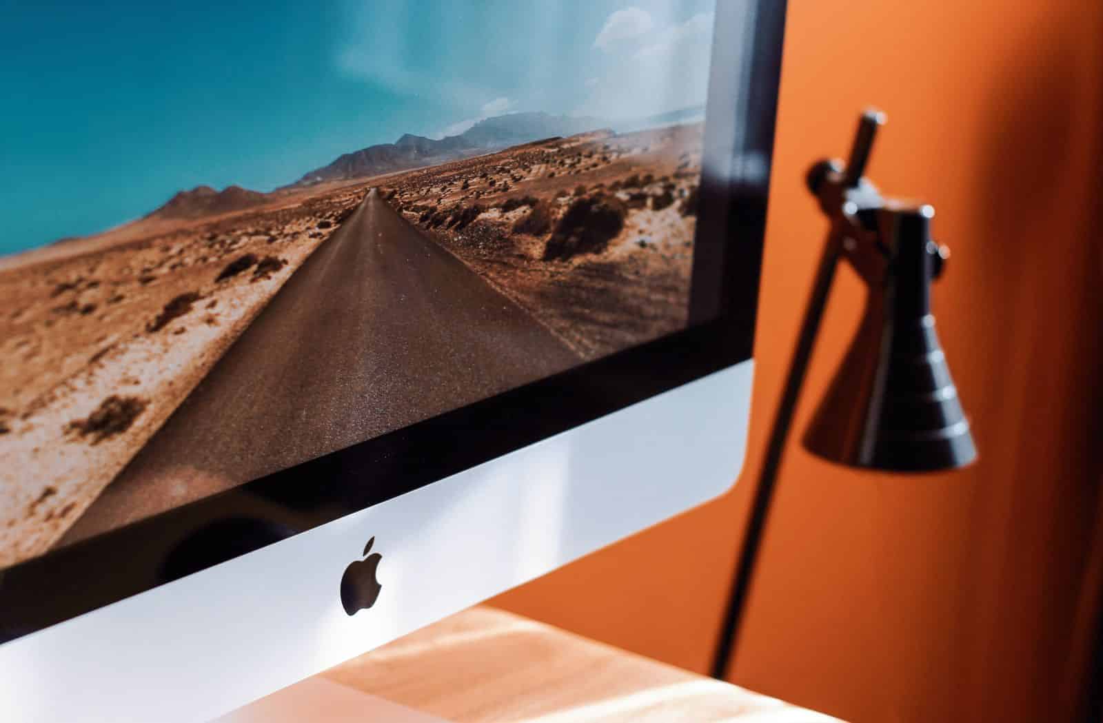 Close-up of an iMac desktop screen, representing Framer AI website builder