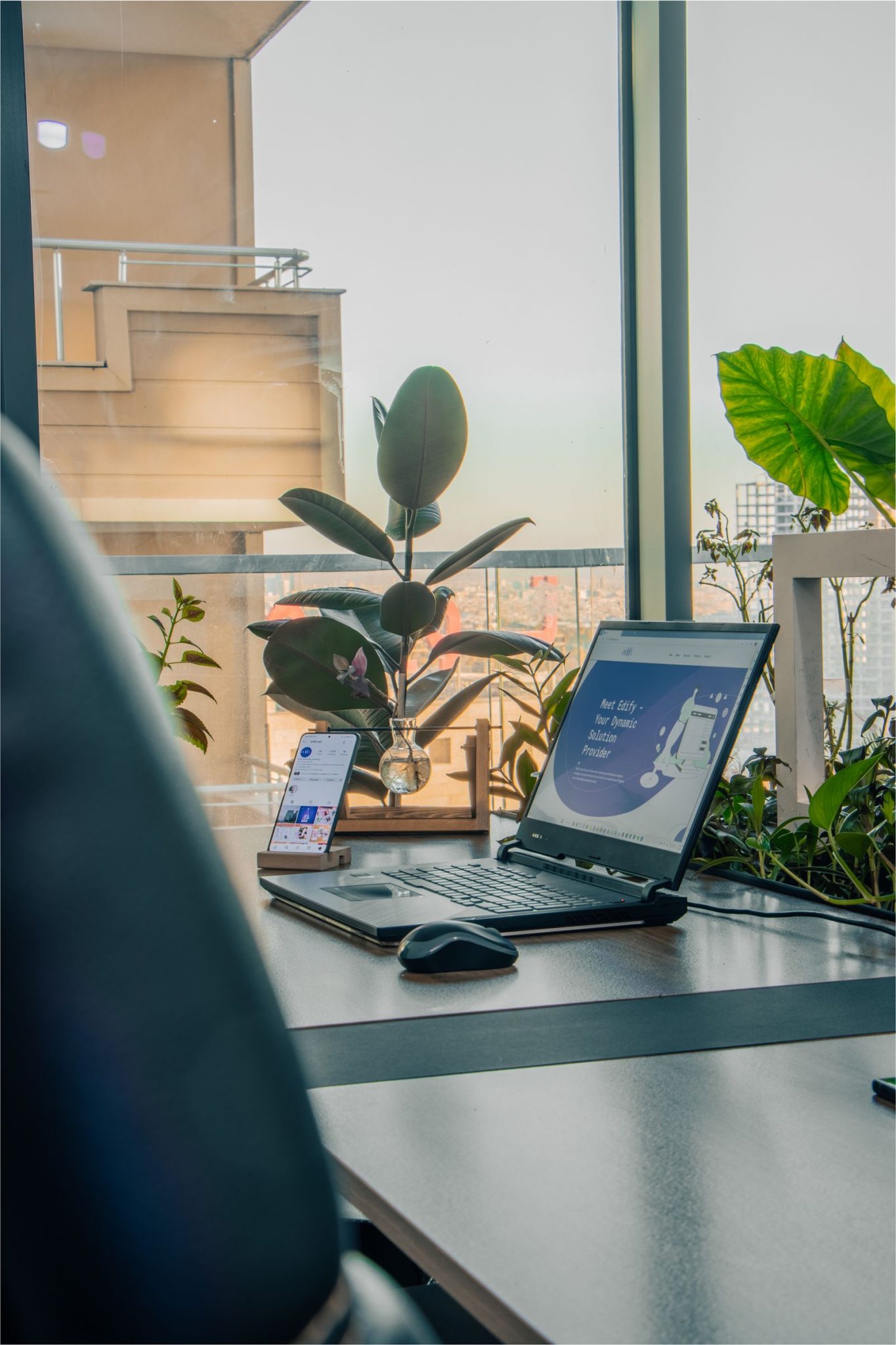 Laptop on a desk in a bright office, representing Google's new Gemini desktop app for Windows